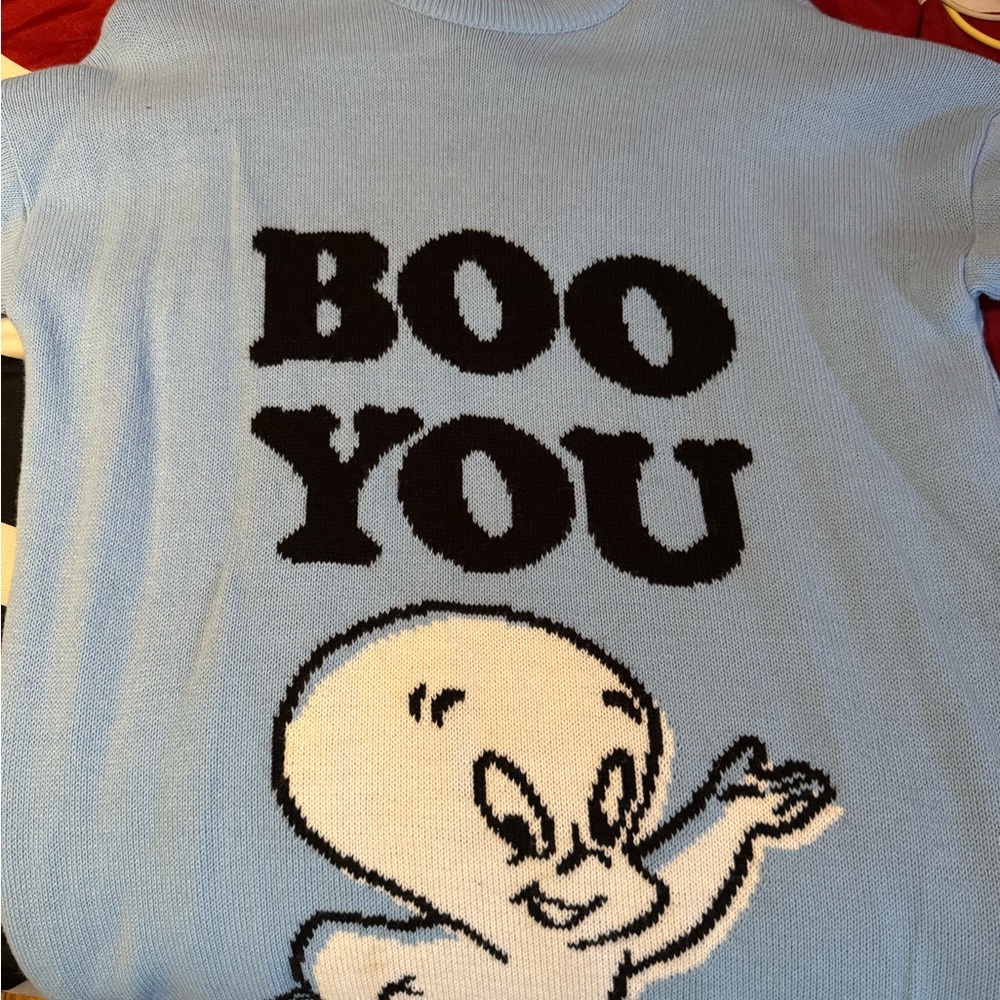 Woman’s Blue Ghost Graphic Sweater